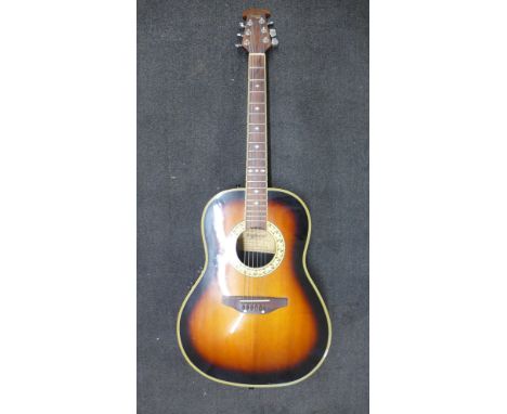 A Tanglewood Odyssey six string semi-acoustic guitar, curved back, model TMO-75 