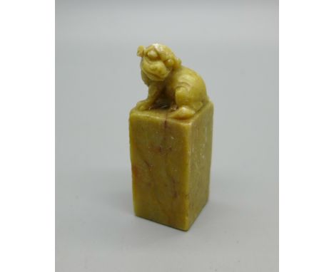 A vintage carved soapstone Chinese dog of foe seal/stamp 