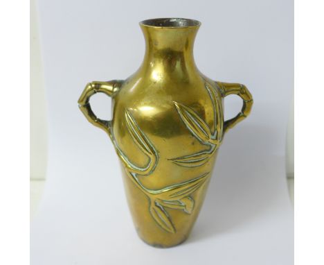 A Japanese Art Nouveau brass vase with bamboo handles, characteristic of Meiji period, 15.5cm 