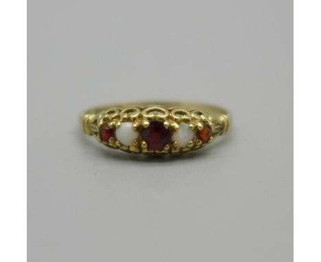 A 9ct gold, opal and garnet Victorian style ring, one opal a/f, 1.4g, P 