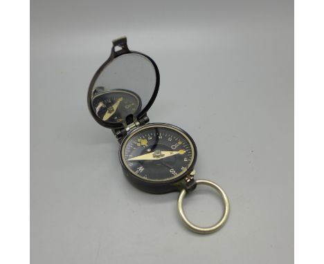 A military compass marked Busch 