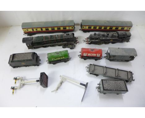A collection of 00 gauge vintage model railway including Hornby coaches, locomotives, wagons (metal), and track 