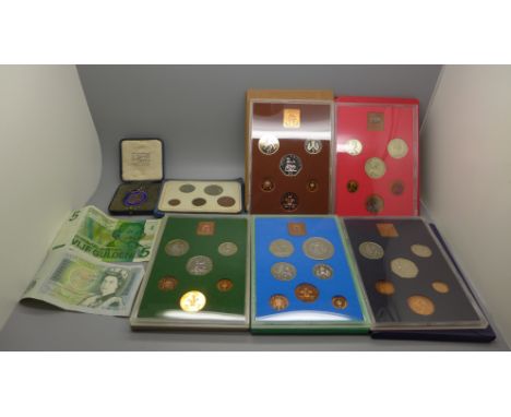 Five GB coin sets, 1972 to 1976, a silver and enamel ICI fob medal 1938, cased, etc. 