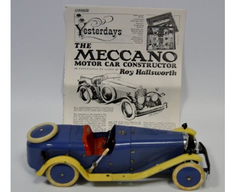 A Meccano No 2 Constructor Car, built as a two-seater, in blue with boat tail, cream mudguards, red seats, 30cm long;  tool k