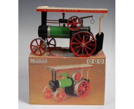 A Mamod steam tractor, boxed with accessories
