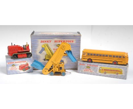 Dinky Supertoys - a 949 Wayne School Bus, with windows and seating, yellow paintwork, blue striped box; a 963 Blaw Knox Heavy