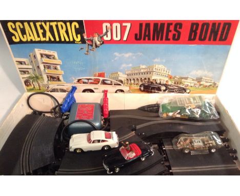 Scalextric - a rare 007 James Bond Chasing Car Set,  comprising Aston Martin, in white with two figures and original sunroof,