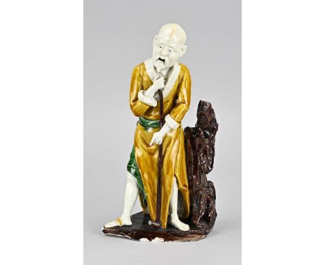 19th Century Chinese or Japanese porcelain polychrome figure. Man with stick. Chips base. Dimensions: H 23 cm. In fair/good c