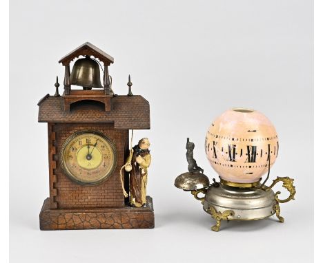 Two antique clocks. 1x Pfeilkreuz alarm clock with monk, automatic, not tested. 1x Night light clock with alarm clock (Brevet