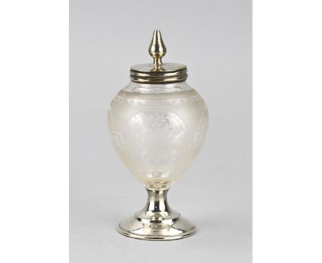 Crystal tea caddy with silver, 835/000. Egg-shaped tea caddy with an etched floral decoration, placed on a silver round base 