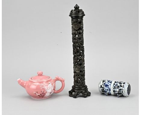 Three parts diverse China. Consisting of; Salmon-colored porcelain teapot with bird decor. Hardwood incense stick holder. Por