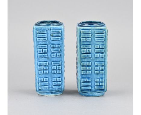 Two square Chinese porcelain vases with light blue glaze and relief decor. 19th century. Dimensions: H 12 cm. In good conditi