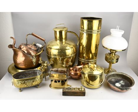 Large lot of old/antique copperware. Among other; milk jug, kettles, umbrella holder, oil lamp, bowls, weight block, candlest