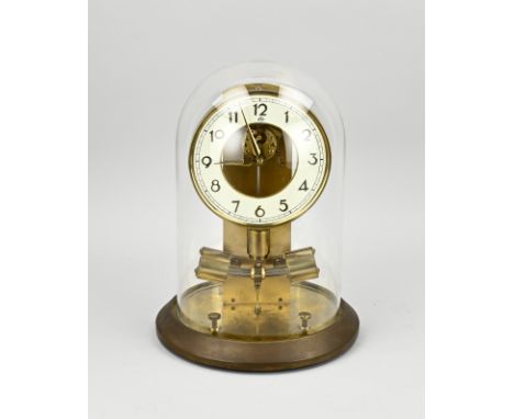Antique Junghans Ato magnetic mantel clock under a glass bell jar. Dimensions: H 28 cm. In good condition.