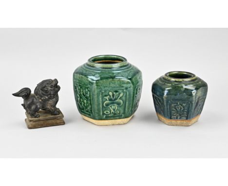 Fate China. Antique. Consisting of: 2x Celadon ginger jar with floral decor. Brass overlay foo dog on wooden console. 19th ce