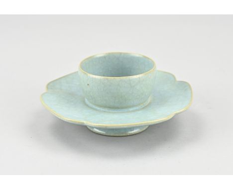 Chinese porcelain celadon holder with blue-green scale-like glaze. Dimensions: 5.5 x 13.7 cm. In good condition.