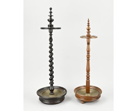 Two antique walnut pipe stoves/stands. Circa 1880 - 1900. Size: 60 - 67 cm. In good condition.
