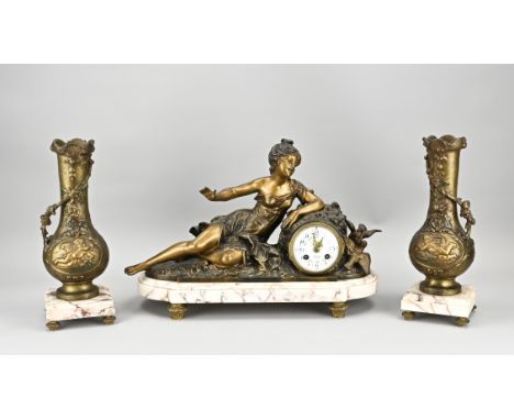 Antique French mantel clock made of composition metal and marble. Bronze colored. Circa 1900. Eight-day movement, half-hourly