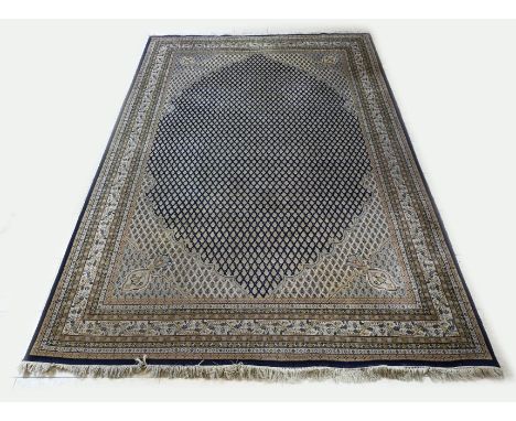 Hand-knotted Persian carpet (Mirr Sarouhg). Color: predominantly blue with a light (beige) edge. Dimensions: 305 x 200 cm. In