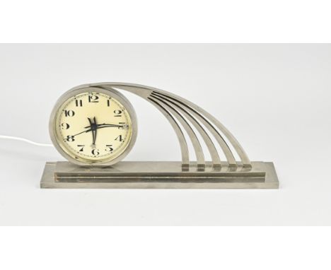 Heavy, Russian Art Deco table clock made of chrome. Electric. First half 20th century. Dimensions: 16 x 35.5 x 7 cm. In good 