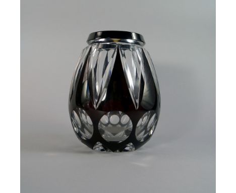 A Val St Lambert damson overlay cut crystal vase, of bulbous form, remains of paper label to base, approx 20cm high. CONDITIO