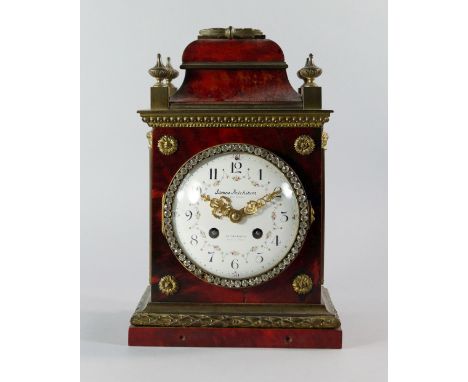 A French stained tortoise shell and gilt metal mantle clock, late 19th/early 20th century, the case of architectural style wi