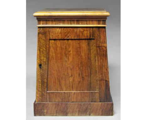 A Victorian mahogany pedestal cupboard, 19th century, the square top over flared base with cupboard door, opening to reveal f