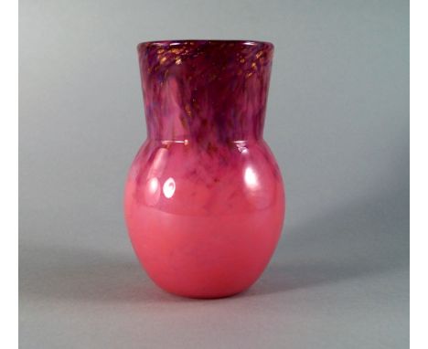 A Monart glass vase, the pink body with blue, green and aventurine inclusions, 17.5cm high.