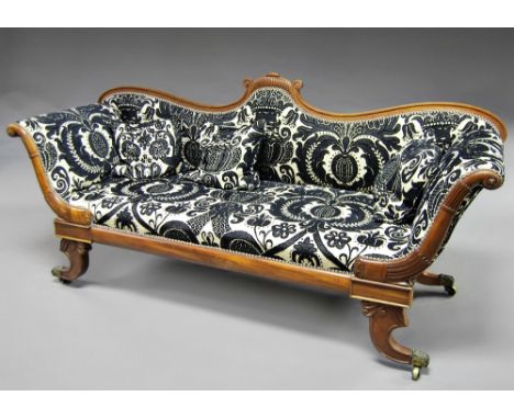 A William IV mahogany scroll arm sofa, 19th century, the central scrolling arch, leading to fluted arms, raised on carved sab