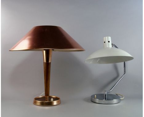 A teak and anodized copper table lamp, probably Danish, mid 20th century, with conical anodized cooper shade, supported by an