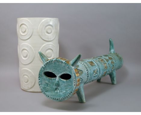 A large pottery stylized cat, in the style of Bisrosi, decorated with turquoise blue glaze, highlighted with gilt geometric p