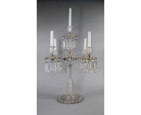 A large glass five light candelabra, 20th century, with central moulded column on spreading foot, topped with a single light 