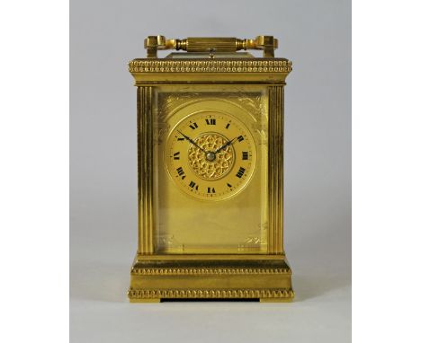 A French brass carriage clock, 20th century, the rectangular case with fluted columns, the face enclosed within Corinthian co