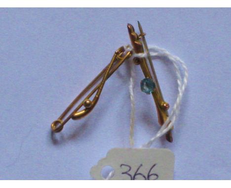 A 9ct hockey stick brooch - Chester &amp; another set with blue stone - 1.7gms Inc.