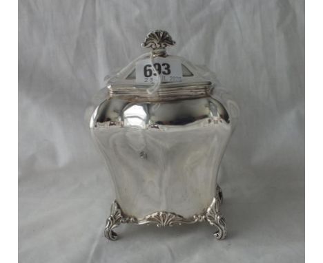 A good tea caddy of Bombe shape on four scroll feet - 6" high - Sheffield 1898 by HW - 286gms