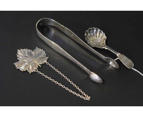 Silver caddy spoon, silver decanter label and silver sugar tongs