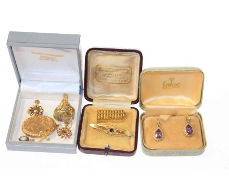 Collection of gold mounted jewellery including sapphire and seed pearl brooch, pair of amethyst earrings, opal pendant, large