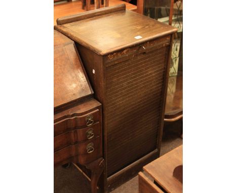 Oak tambour front filing cabinet and 1930's mahogany mantel clock (2)