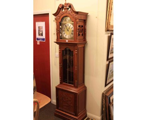 Oriental style carved redwood triple weight longcase clock