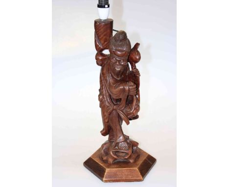 Carved Oriental figure table lamp