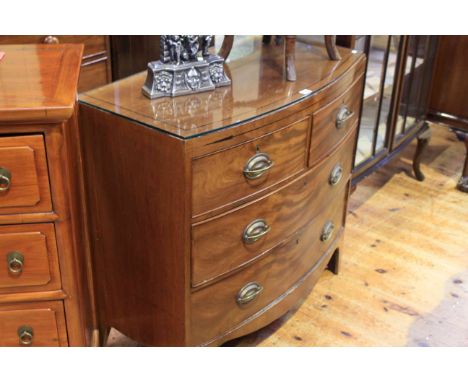 19th Century mahogany bow front chest of two short above two long drawers on splayed bracket feet