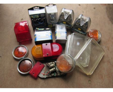 A box of light lenses and high performance bulbs 