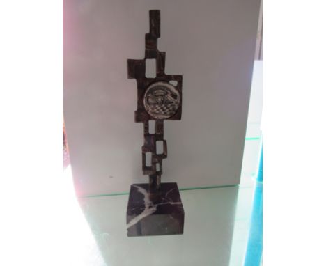 An abstract bronze trophy mounted on marble plinth - no makers name 