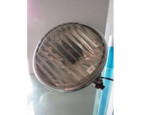 A chromed head lamp