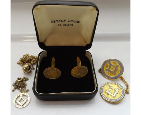 SELECTION OF MASONIC JEWELLERYcomprising a metamorphic ball pendant, opening to reveal a cross with Masonic symbols, marked J