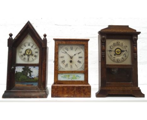 THREE AMERICAN PINE CASED MANTLE CLOCKSincluding a 'Jerome & Co' eight day example in an arched case and glass door painted w