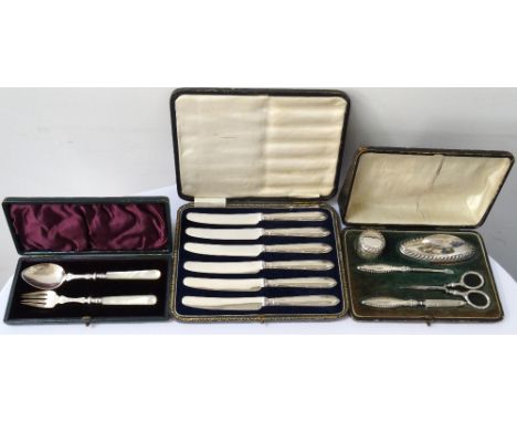 GEORGE V SET OF SIX SILVER DESSERT KNIVESwith stainless steel blades, Sheffield 1923; a Victorian christening set comprising 