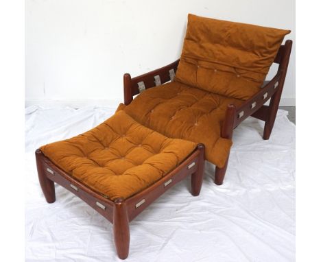 1960s DESIGNER TEAK FRAMED ARMCHAIRlow style, of generous proportion, the shaped frame with adjustable support strapping, but