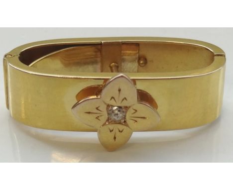 VICTORIAN CLEAR GEM SET NINE CARAT GOLD SCARF RINGthe central gemstone in floral setting, hallmarked for Birmingham 1876