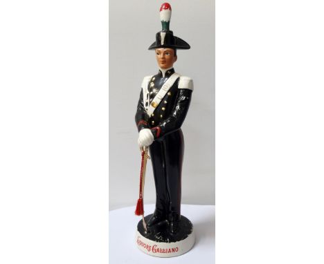 1970s ITALIAN 'LIQUORE GALLIANO' CERAMIC BAR ADVERTISING DECANTERmodelled as a military figure with sword, the base marked 'C